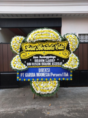Papan Bunga Duka di Waropko